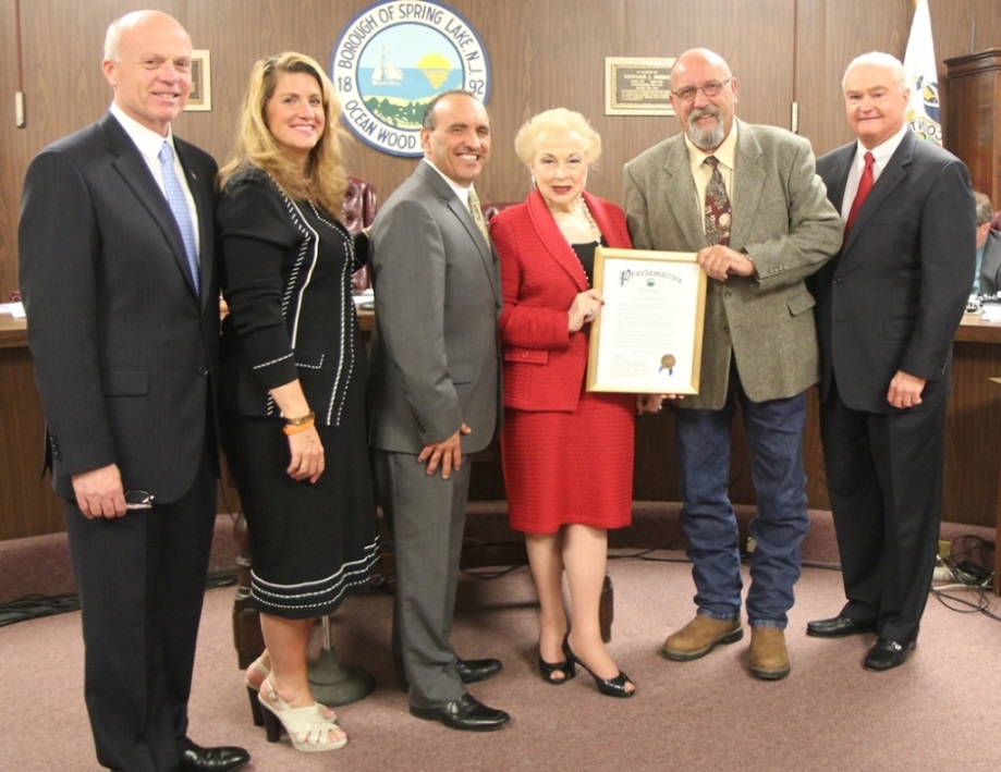 The Monmouth County Board of Chosen Freeholders presented a proclamation to commemorate Autism Awareness Month to Franny Hines of Belmar, who has a seventeen year-old son with autism, at their regular public meeting on April 23 in Spring Lake, NJ. Pictured left to right: Freeholder Director Gary J. Rich, Sr., Freeholder Deputy Director Serena DiMaso, Freeholder Thomas A. Arnone, Freeholder Lillian G. Burry, Franny Hines and Freeholder John P. Curley.